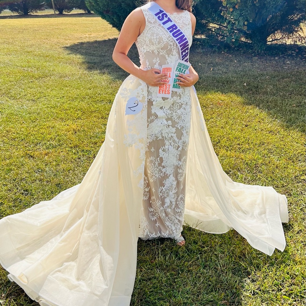 Sherri Hill with overskirt, fits size 2, comes with matching Jim Ball earrings.